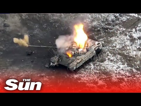 Moment Ukrainian Kamikaze drone crashes into Russian tank blowing it to pieces