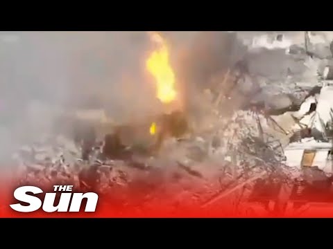 Russian T-90M tank EXPLODES as Ukrainian drone stealthily drops grenade