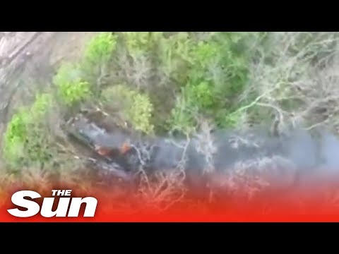Ukrainian Kamikaze drone crashes into Russian armoured vehicle
