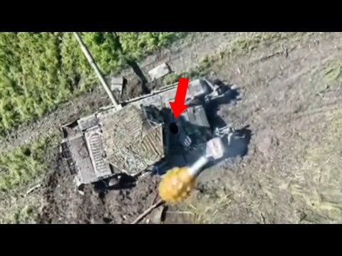 Russian T-80BV With Cope Cage Gets Target By Drone Dropping Grenade
