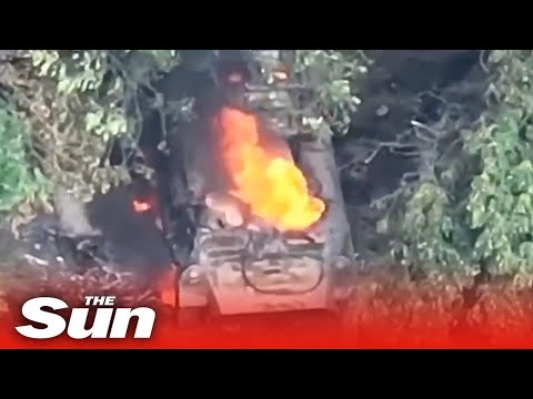 Russian tank set on fire after direct hit by Ukrainian drone strike