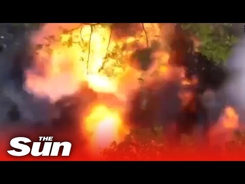 Ukrainian drone drops bomb on Russian soldiers blowing up in MASSIVE explosion